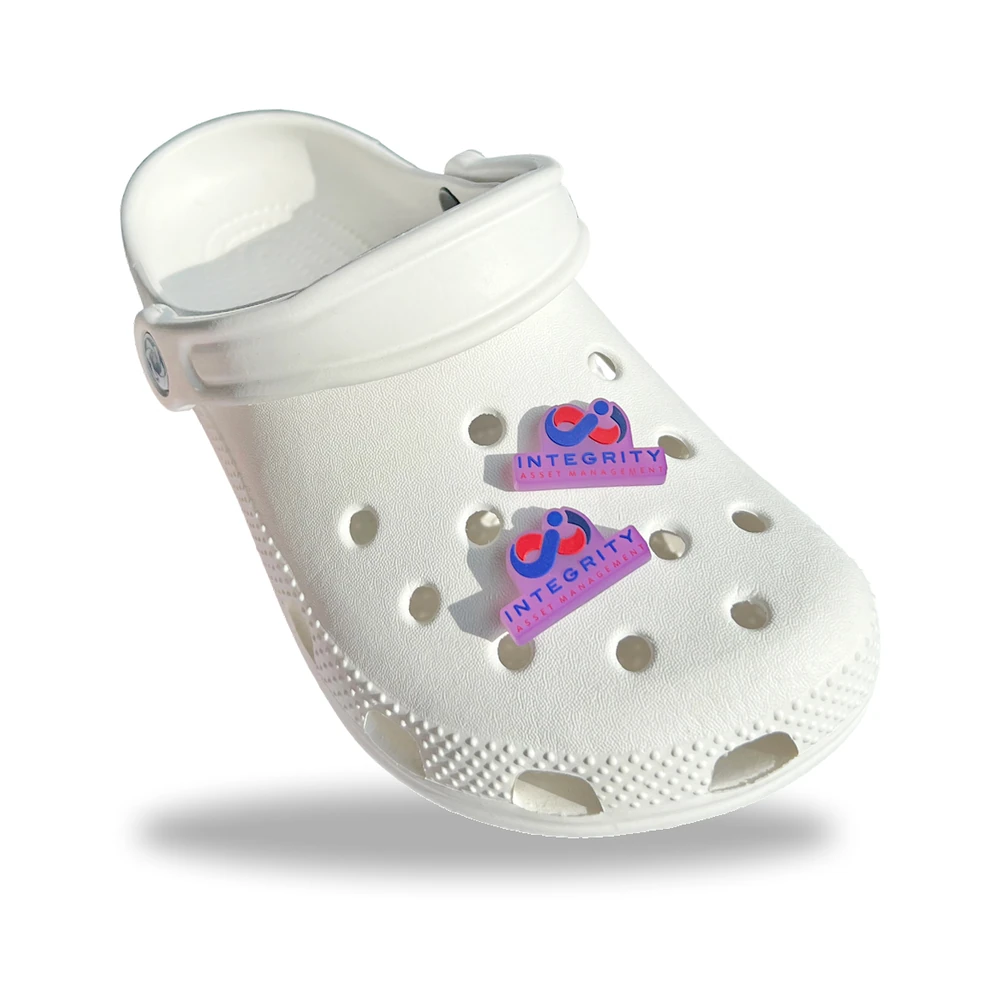 Custom clog charms – Integrity Asset Management logos on a white clog