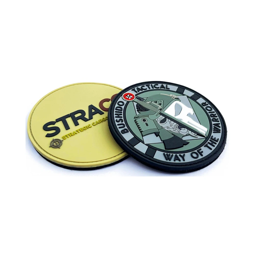 Custom circular PVC rubber patches with bold embossed text and tactical graphics