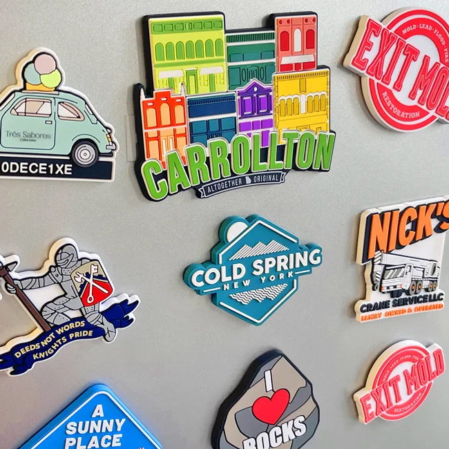 Custom rubber fridge magnets displayed on a refrigerator door