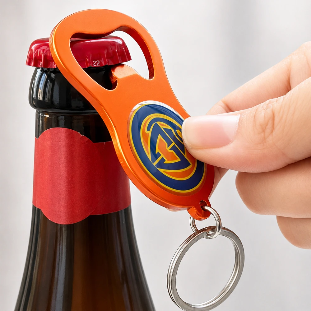 Custom aluminium bottle opener keychain opening a bottle — orange anodized finish UK